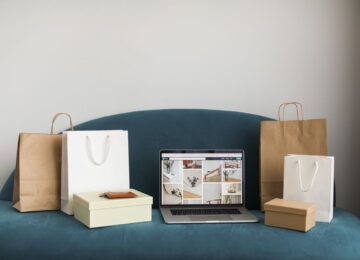Magento auf Shopify migrieren - Laptop mit E-Commerce Dashboard